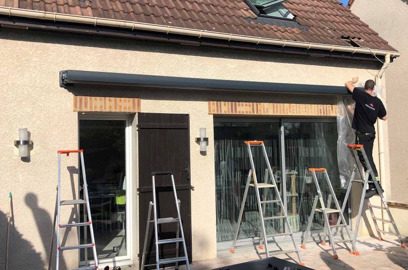 Poser un store banne motorisé à Sannois